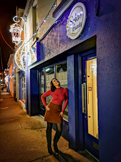 kate standing in front of salon